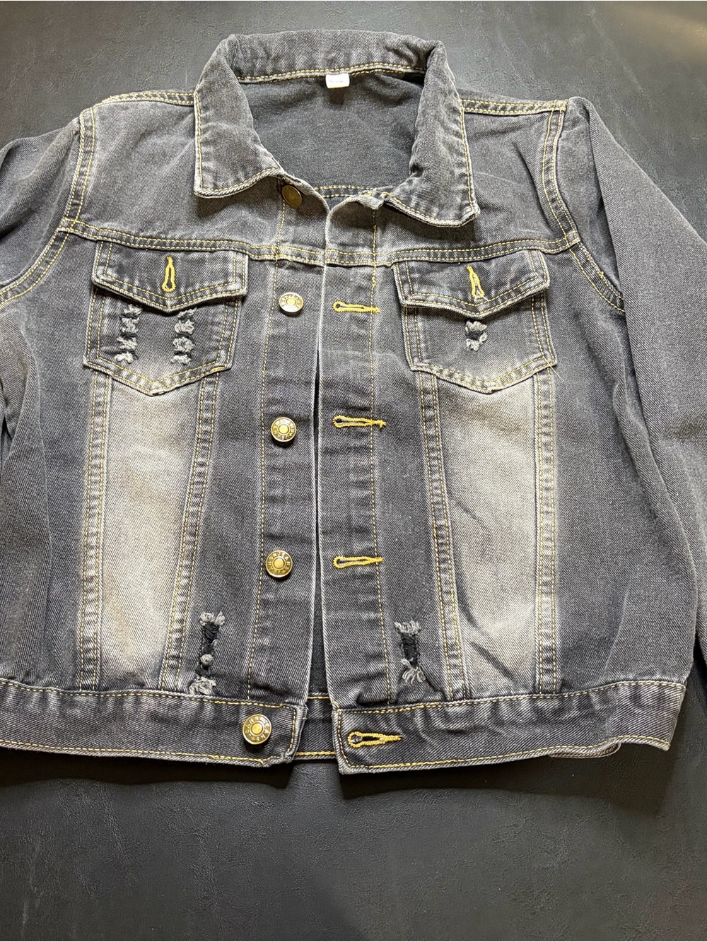 Distressed Black Denim Jacket with Faded Panels